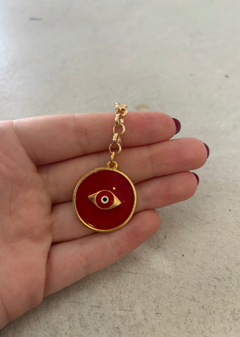 RED EYE BAG CHARM KEYRING