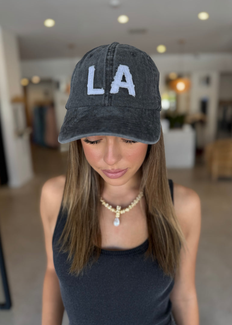 LA TRUCKER HAT BLACK SNOW