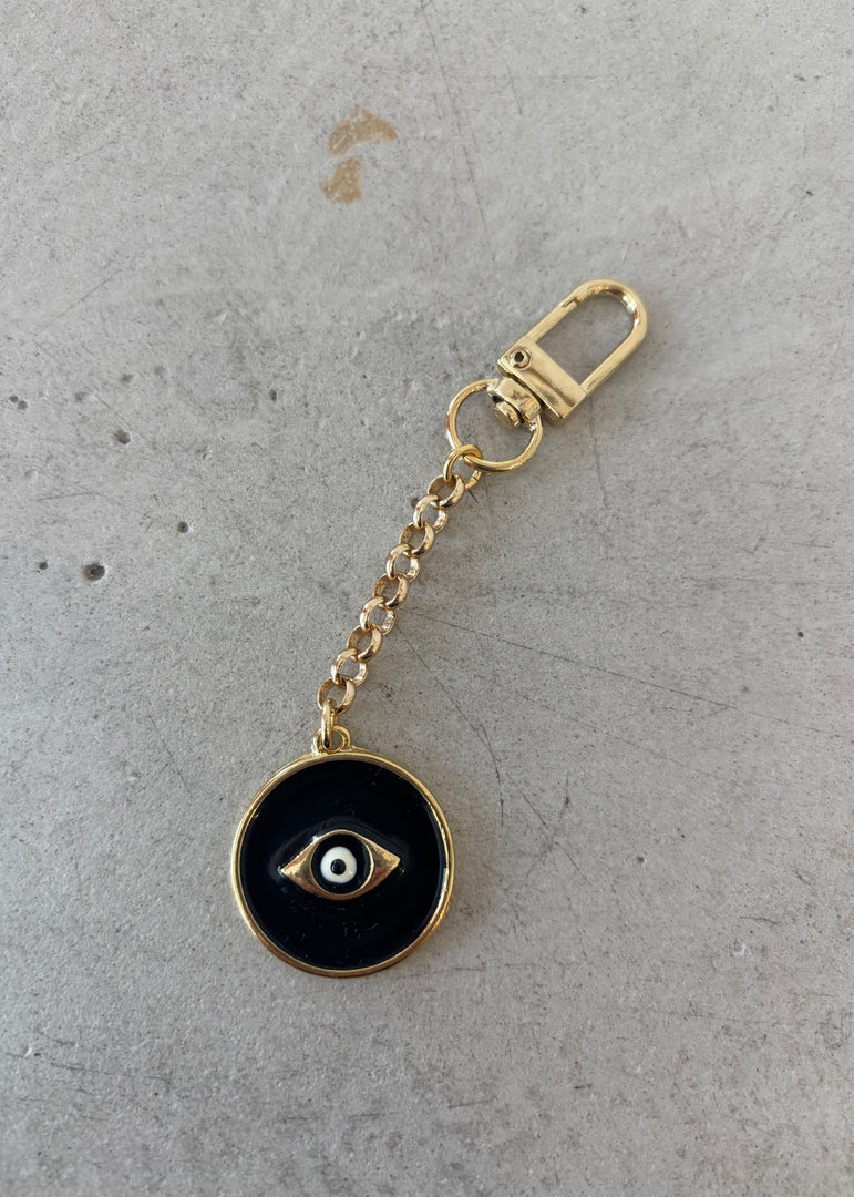 BLACK EYE BAG CHAR KEYRING