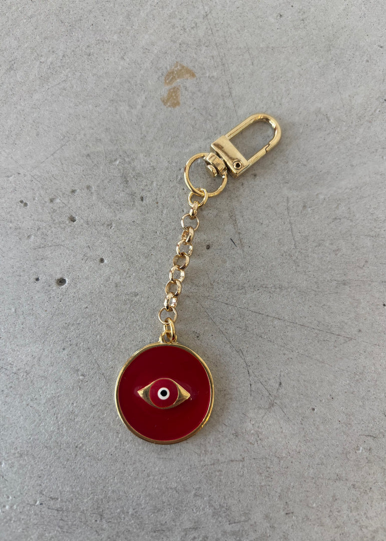 RED EYE BAG CHARM KEYRING